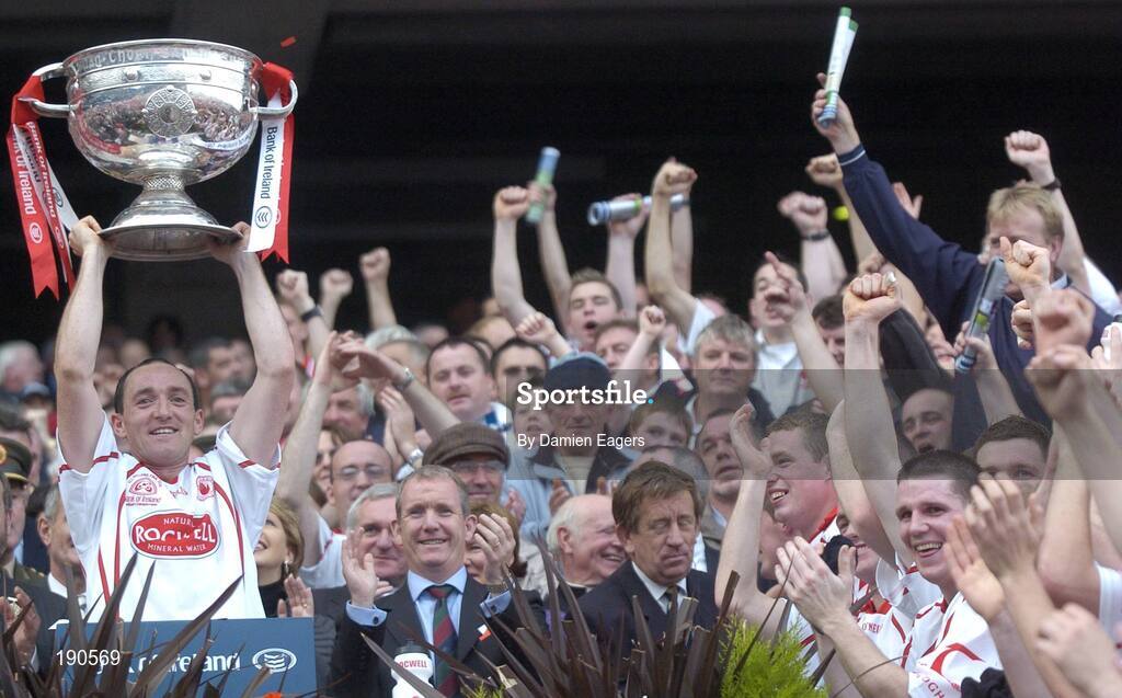 25 September 2005; Tyrone captain Brian Dooher lifts the Sam Maguire Cup. Bank of Ireland All-Ireland Senior Football Championship Final, Kerry v Tyrone, Croke Park, Dublin. Picture credit; Damien Eagers/ SPORTSFILE *** Local Caption *** Any photograph taken by SPORTSFILE during, or in connection with, the 2005 Bank of Ireland All-Ireland Senior Football Final which displays GAA logos or contains an image or part of an image of any GAA intellectual property, or, which contains images of a GAA player/players in their playing uniforms, may only be used for editorial and non-advertising purposes.  Use of photographs for advertising, as posters or for purchase separately is strictly prohibited unless prior written approval has been obtained from the Gaelic Athletic Association.