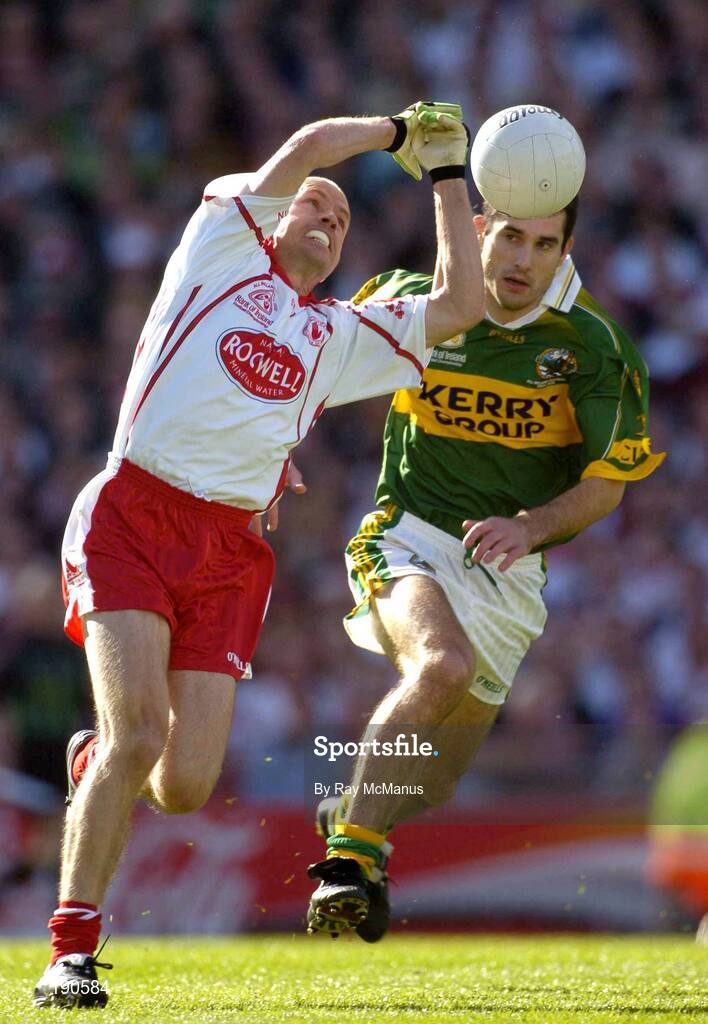 25 September 2005; Peter Canavan, Tyrone, in action against Tom O'Sullivan, Kerry. Bank of Ireland All-Ireland Senior Football Championship Final, Kerry v Tyrone, Croke Park, Dublin. Picture credit; Ray McManus / SPORTSFILE *** Local Caption *** Any photograph taken by SPORTSFILE during, or in connection with, the 2005 Bank of Ireland All-Ireland Senior Football Final which displays GAA logos or contains an image or part of an image of any GAA intellectual property, or, which contains images of a GAA player/players in their playing uniforms, may only be used for editorial and non-advertising purposes.  Use of photographs for advertising, as posters or for purchase separately is strictly prohibited unless prior written approval has been obtained from the Gaelic Athletic Association.
