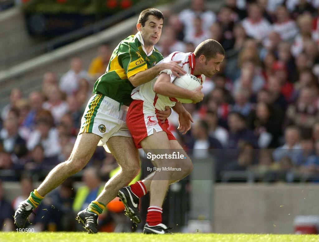 25 September 2005; Stephen O'Neill, Tyrone, in action against Tom O'Sullivan, Kerry. Bank of Ireland All-Ireland Senior Football Championship Final, Kerry v Tyrone, Croke Park, Dublin. Picture credit; Ray McManus / SPORTSFILE *** Local Caption *** Any photograph taken by SPORTSFILE during, or in connection with, the 2005 Bank of Ireland All-Ireland Senior Football Final which displays GAA logos or contains an image or part of an image of any GAA intellectual property, or, which contains images of a GAA player/players in their playing uniforms, may only be used for editorial and non-advertising purposes.  Use of photographs for advertising, as posters or for purchase separately is strictly prohibited unless prior written approval has been obtained from the Gaelic Athletic Association.