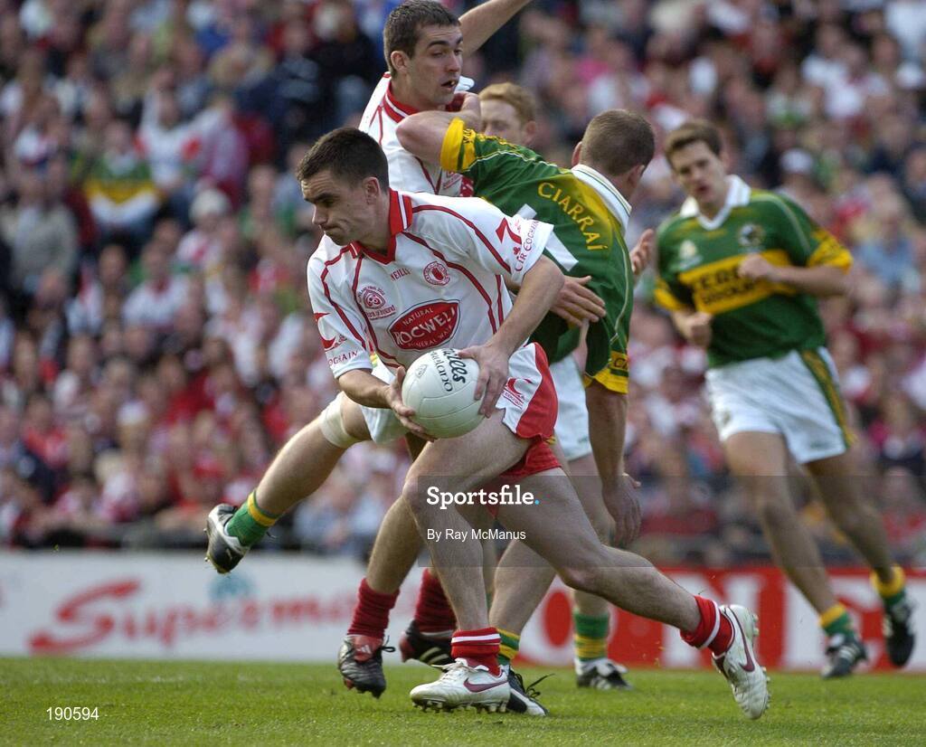 25 September 2005; Ryan McMenanin, Tyrone, prepares to clear. Bank of Ireland All-Ireland Senior Football Championship Final, Kerry v Tyrone, Croke Park, Dublin. Picture credit; Ray McManus / SPORTSFILE *** Local Caption *** Any photograph taken by SPORTSFILE during, or in connection with, the 2005 Bank of Ireland All-Ireland Senior Football Final which displays GAA logos or contains an image or part of an image of any GAA intellectual property, or, which contains images of a GAA player/players in their playing uniforms, may only be used for editorial and non-advertising purposes.  Use of photographs for advertising, as posters or for purchase separately is strictly prohibited unless prior written approval has been obtained from the Gaelic Athletic Association.