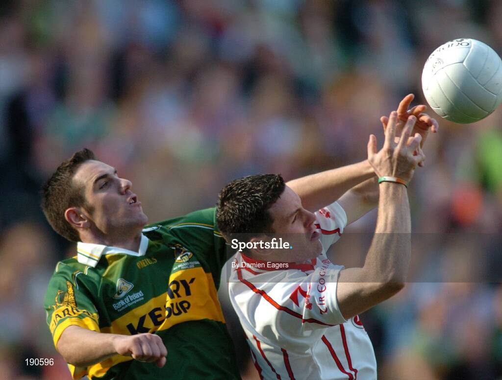 25 September 2005; Conor Gormley, Tyrone, in action against Declan O'Sullivan, Kerry. Bank of Ireland All-Ireland Senior Football Championship Final, Kerry v Tyrone, Croke Park, Dublin. Picture credit; Damien Eagers/ SPORTSFILE *** Local Caption *** Any photograph taken by SPORTSFILE during, or in connection with, the 2005 Bank of Ireland All-Ireland Senior Football Final which displays GAA logos or contains an image or part of an image of any GAA intellectual property, or, which contains images of a GAA player/players in their playing uniforms, may only be used for editorial and non-advertising purposes.  Use of photographs for advertising, as posters or for purchase separately is strictly prohibited unless prior written approval has been obtained from the Gaelic Athletic Association.