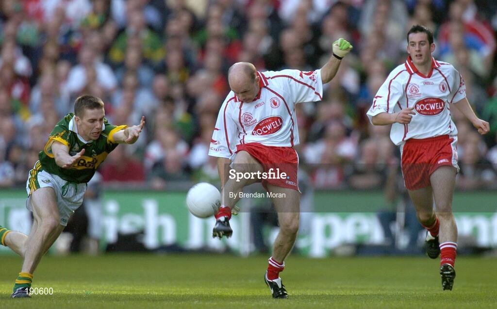 25 September 2005; Peter Canavan, Tyrone, in action against Marc O Se, Kerry. Bank of Ireland All-Ireland Senior Football Championship Final, Kerry v Tyrone, Croke Park, Dublin. Picture credit; Brendan Moran / SPORTSFILE *** Local Caption *** Any photograph taken by SPORTSFILE during, or in connection with, the 2005 Bank of Ireland All-Ireland Senior Football Final which displays GAA logos or contains an image or part of an image of any GAA intellectual property, or, which contains images of a GAA player/players in their playing uniforms, may only be used for editorial and non-advertising purposes.  Use of photographs for advertising, as posters or for purchase separately is strictly prohibited unless prior written approval has been obtained from the Gaelic Athletic Association.