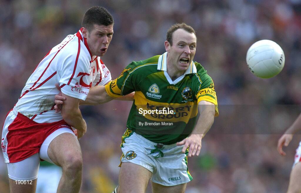 25 September 2005; Seamus Moynihan, Kerry, in action against Sean Cavanagh, Tyrone. Bank of Ireland All-Ireland Senior Football Championship Final, Kerry v Tyrone, Croke Park, Dublin. Picture credit; Brendan Moran / SPORTSFILE *** Local Caption *** Any photograph taken by SPORTSFILE during, or in connection with, the 2005 Bank of Ireland All-Ireland Senior Football Final which displays GAA logos or contains an image or part of an image of any GAA intellectual property, or, which contains images of a GAA player/players in their playing uniforms, may only be used for editorial and non-advertising purposes.  Use of photographs for advertising, as posters or for purchase separately is strictly prohibited unless prior written approval has been obtained from the Gaelic Athletic Association.