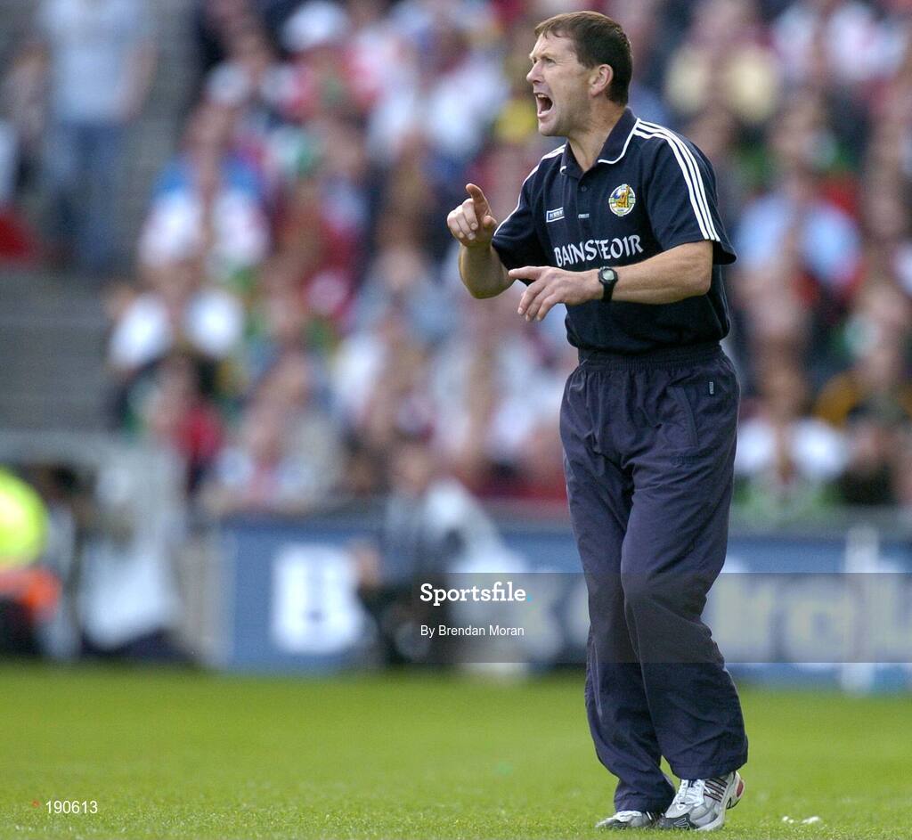 25 September 2005; Kerry manager Jack O'Connor issues instructions to his players during the game. Bank of Ireland All-Ireland Senior Football Championship Final, Kerry v Tyrone, Croke Park, Dublin. Picture credit; Brendan Moran / SPORTSFILE *** Local Caption *** Any photograph taken by SPORTSFILE during, or in connection with, the 2005 Bank of Ireland All-Ireland Senior Football Final which displays GAA logos or contains an image or part of an image of any GAA intellectual property, or, which contains images of a GAA player/players in their playing uniforms, may only be used for editorial and non-advertising purposes.  Use of photographs for advertising, as posters or for purchase separately is strictly prohibited unless prior written approval has been obtained from the Gaelic Athletic Association.