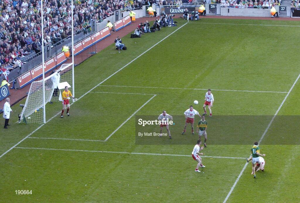25 September 2005; Eoin Brosnan (11), Kerry, kicks a point against Tyrone. Bank of Ireland All-Ireland Senior Football Championship Final, Kerry v Tyrone, Croke Park, Dublin. Picture credit; Matt Browne / SPORTSFILE *** Local Caption *** Any photograph taken by SPORTSFILE during, or in connection with, the 2005 Bank of Ireland All-Ireland Senior Football Final which displays GAA logos or contains an image or part of an image of any GAA intellectual property, or, which contains images of a GAA player/players in their playing uniforms, may only be used for editorial and non-advertising purposes.  Use of photographs for advertising, as posters or for purchase separately is strictly prohibited unless prior written approval has been obtained from the Gaelic Athletic Association.