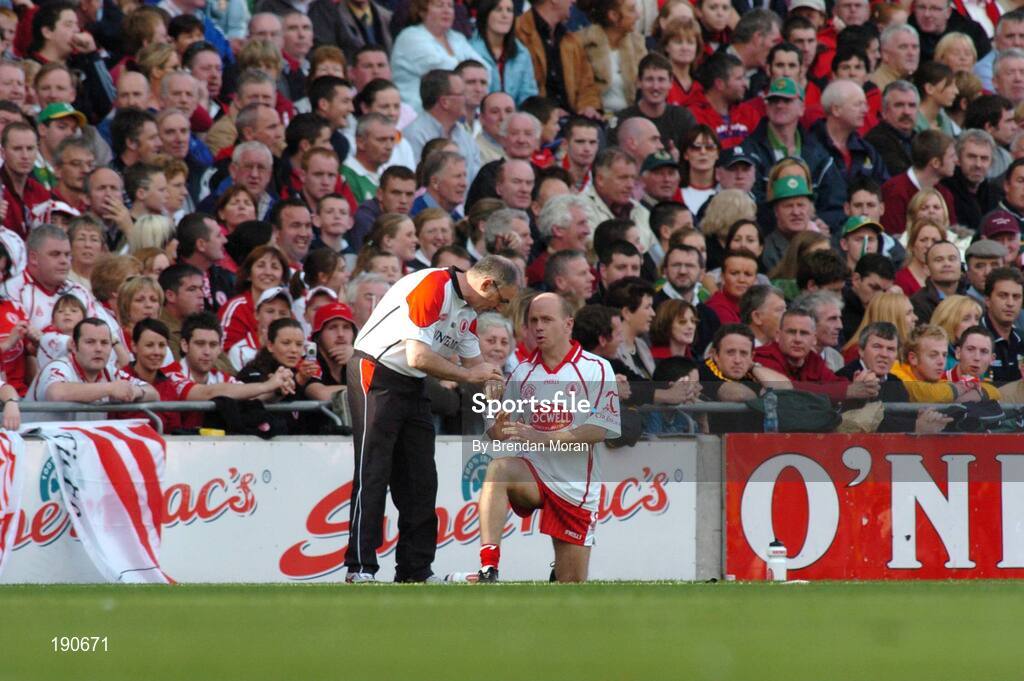 25 September 2005; Tyrone manager Mickey Harte in conversation with Peter Canavan before Canavan came on during the second half. Bank of Ireland All-Ireland Senior Football Championship Final, Kerry v Tyrone, Croke Park, Dublin. Picture credit; Brendan Moran / SPORTSFILE *** Local Caption *** Any photograph taken by SPORTSFILE during, or in connection with, the 2005 Bank of Ireland All-Ireland Senior Football Final which displays GAA logos or contains an image or part of an image of any GAA intellectual property, or, which contains images of a GAA player/players in their playing uniforms, may only be used for editorial and non-advertising purposes.  Use of photographs for advertising, as posters or for purchase separately is strictly prohibited unless prior written approval has been obtained from the Gaelic Athletic Association.