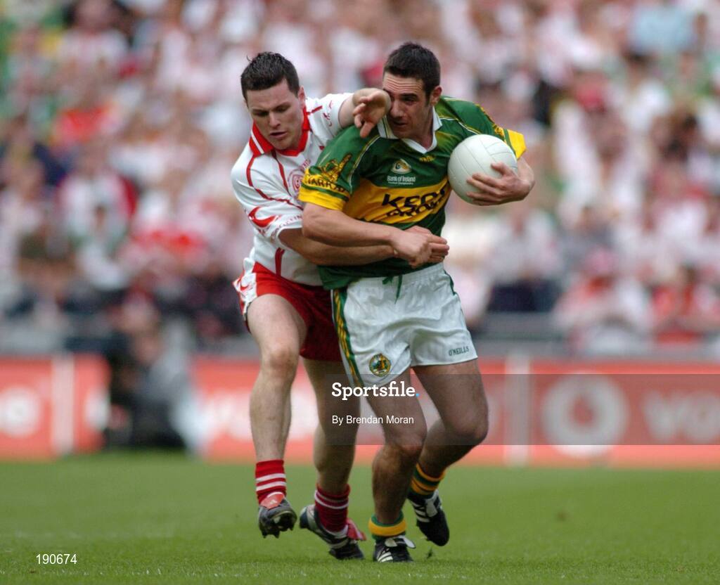 25 September 2005; Declan O'Sullivan, Kerry, in action against Conor Gormley, Tyrone. Bank of Ireland All-Ireland Senior Football Championship Final, Kerry v Tyrone, Croke Park, Dublin. Picture credit; Brendan Moran / SPORTSFILE *** Local Caption *** Any photograph taken by SPORTSFILE during, or in connection with, the 2005 Bank of Ireland All-Ireland Senior Football Final which displays GAA logos or contains an image or part of an image of any GAA intellectual property, or, which contains images of a GAA player/players in their playing uniforms, may only be used for editorial and non-advertising purposes.  Use of photographs for advertising, as posters or for purchase separately is strictly prohibited unless prior written approval has been obtained from the Gaelic Athletic Association.