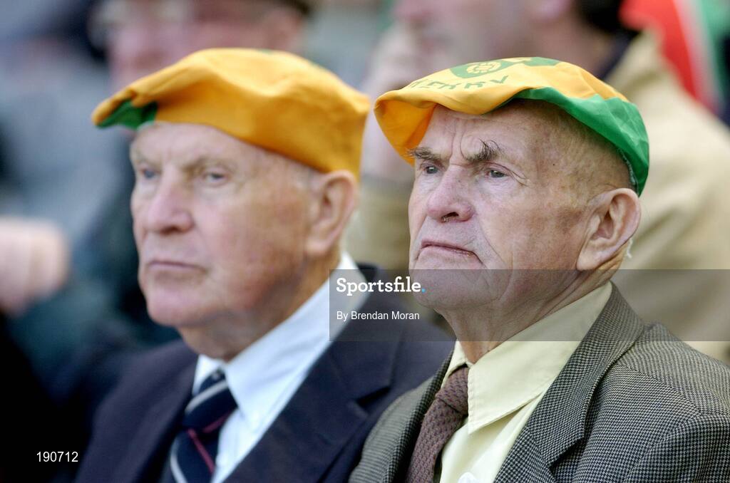 25 September 2005; Two elderly Kerry fans watch their side in action against Tyrone. Bank of Ireland All-Ireland Senior Football Championship Final, Kerry v Tyrone, Croke Park, Dublin. Picture credit; Brendan Moran / SPORTSFILE *** Local Caption *** Any photograph taken by SPORTSFILE during, or in connection with, the 2005 Bank of Ireland All-Ireland Senior Football Final which displays GAA logos or contains an image or part of an image of any GAA intellectual property, or, which contains images of a GAA player/players in their playing uniforms, may only be used for editorial and non-advertising purposes.  Use of photographs for advertising, as posters or for purchase separately is strictly prohibited unless prior written approval has been obtained from the Gaelic Athletic Association.
