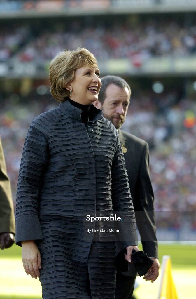 25 September 2005; President Mary McAleese, accompanied by Sean Kelly, President of the GAA, makes her way to the Ard Comhairle after meeting the two teams. Bank of Ireland All-Ireland Senior Football Championship Final, Kerry v Tyrone, Croke Park, Dublin. Picture credit; Brendan Moran / SPORTSFILE *** Local Caption *** Any photograph taken by SPORTSFILE during, or in connection with, the 2005 Bank of Ireland All-Ireland Senior Football Final which displays GAA logos or contains an image or part of an image of any GAA intellectual property, or, which contains images of a GAA player/players in their playing uniforms, may only be used for editorial and non-advertising purposes.  Use of photographs for advertising, as posters or for purchase separately is strictly prohibited unless prior written approval has been obtained from the Gaelic Athletic Association.