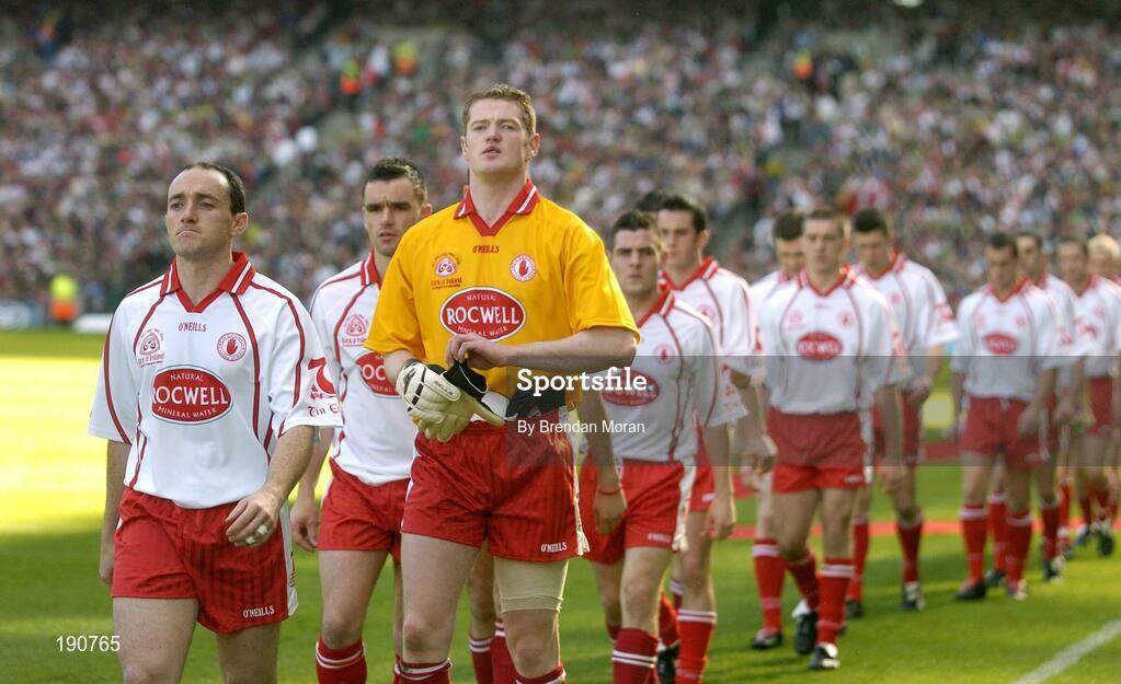 25 September 2005; Tyrone captain Brian Dooher leads his side in the pre-match parade. Bank of Ireland All-Ireland Senior Football Championship Final, Kerry v Tyrone, Croke Park, Dublin. Picture credit; Brendan Moran / SPORTSFILE *** Local Caption *** Any photograph taken by SPORTSFILE during, or in connection with, the 2005 Bank of Ireland All-Ireland Senior Football Final which displays GAA logos or contains an image or part of an image of any GAA intellectual property, or, which contains images of a GAA player/players in their playing uniforms, may only be used for editorial and non-advertising purposes.  Use of photographs for advertising, as posters or for purchase separately is strictly prohibited unless prior written approval has been obtained from the Gaelic Athletic Association.