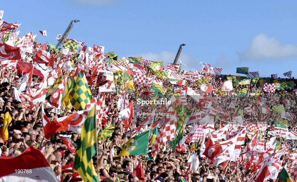 25 September 2005; Tyrone and Kerry fans cheer on their side from Hill 16. Bank of Ireland All-Ireland Senior Football Championship Final, Kerry v Tyrone, Croke Park, Dublin. Picture credit; Brendan Moran / SPORTSFILE *** Local Caption *** Any photograph taken by SPORTSFILE during, or in connection with, the 2005 Bank of Ireland All-Ireland Senior Football Final which displays GAA logos or contains an image or part of an image of any GAA intellectual property, or, which contains images of a GAA player/players in their playing uniforms, may only be used for editorial and non-advertising purposes.  Use of photographs for advertising, as posters or for purchase separately is strictly prohibited unless prior written approval has been obtained from the Gaelic Athletic Association.