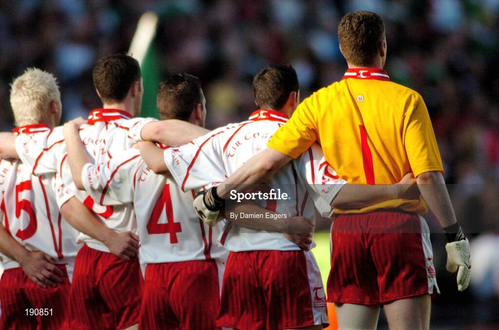 25 September 2005; Tyrone players from left Owen Mulligan, Enda McGinley, Michael McGee, Davy Harte and goalkeeper Pascal McConnell stand for the national anthem Amhran na bhFiann. Bank of Ireland All-Ireland Senior Football Championship Final, Kerry v Tyrone, Croke Park, Dublin. Picture credit; Damien Eagers/ SPORTSFILE *** Local Caption *** Any photograph taken by SPORTSFILE during, or in connection with, the 2005 Bank of Ireland All-Ireland Senior Football Final which displays GAA logos or contains an image or part of an image of any GAA intellectual property, or, which contains images of a GAA player/players in their playing uniforms, may only be used for editorial and non-advertising purposes.  Use of photographs for advertising, as posters or for purchase separately is strictly prohibited unless prior written approval has been obtained from the Gaelic Athletic Association.