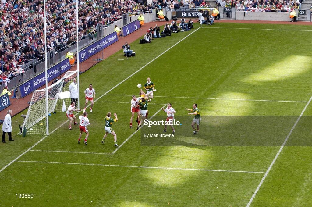 25 September 2005; Eoin Brosnan, 11, Kerry, goes highest and punches the ball goalwards but went wide. Bank of Ireland All-Ireland Senior Football Championship Final, Kerry v Tyrone, Croke Park, Dublin. Picture credit; Matt Browne / SPORTSFILE *** Local Caption *** Any photograph taken by SPORTSFILE during, or in connection with, the 2005 Bank of Ireland All-Ireland Senior Football Final which displays GAA logos or contains an image or part of an image of any GAA intellectual property, or, which contains images of a GAA player/players in their playing uniforms, may only be used for editorial and non-advertising purposes.  Use of photographs for advertising, as posters or for purchase separately is strictly prohibited unless prior written approval has been obtained from the Gaelic Athletic Association.
