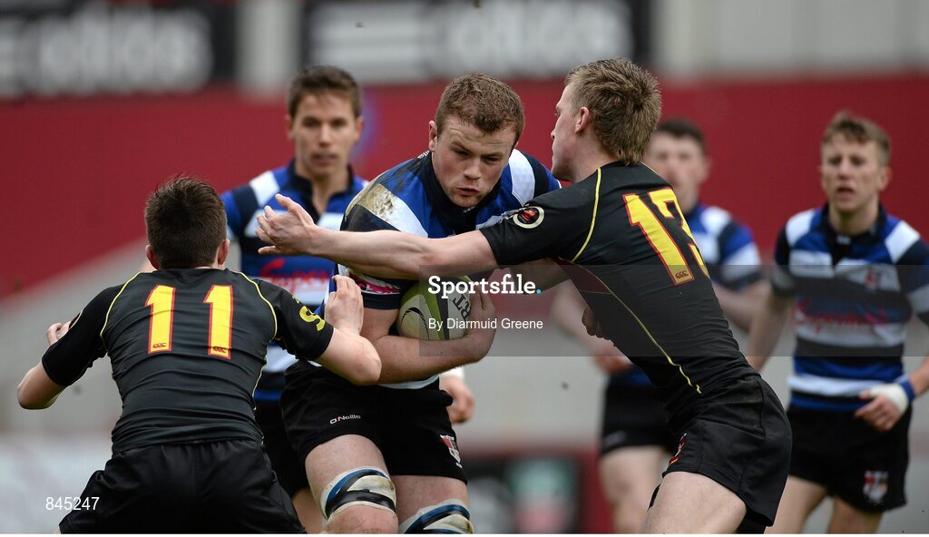 17 March 2014; Cormac Blake, Crescent College, is tackled by Paul McNamara, right, and Liam Brock, Ard Scoil Ris. SEAT Munster Schools Senior Cup Final, Ard Scoil Ris v Crescent College, Thomond Park, Limerick. Picture credit: Diarmuid Greene / SPORTSFILE