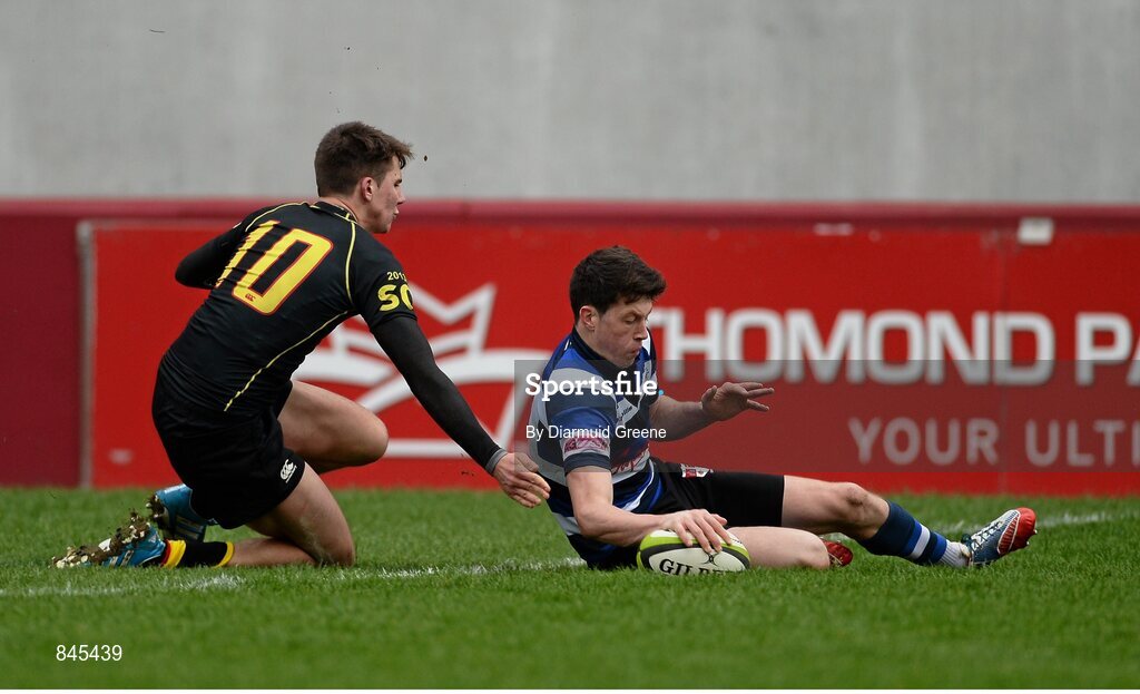 17 March 2014; Dylan Sheehan, Crescent College, scores his side's second try despite the efforts of David O'Mahony, Ardscoil Ris. SEAT Munster Schools Senior Cup Final, Ard Scoil Ris v Crescent College Comprehensive, Thomond Park, Limerick. Picture credit: Diarmuid Greene / SPORTSFILE