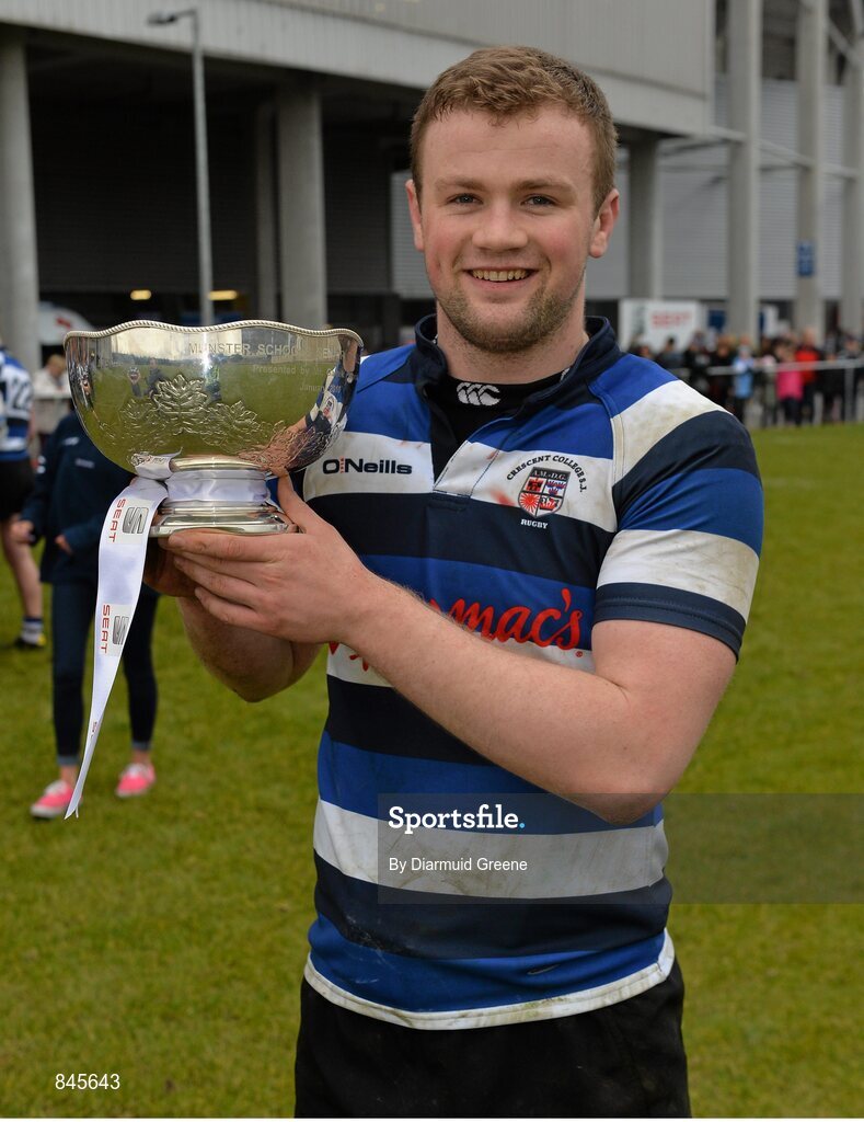 17 March 2014; Crescent College captain Cormac Blake lifts the cup after defeating Ardscoil Ris. SEAT Munster Schools Senior Cup Final, Ard Scoil Ris v Crescent College Comprehensive, Thomond Park, Limerick. Picture credit: Diarmuid Greene / SPORTSFILE