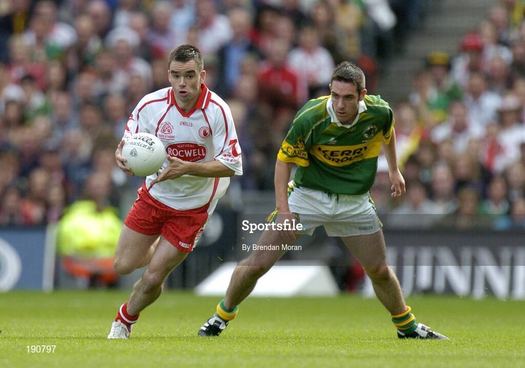 25 September 2005; Ryan McMenamin, Tyrone, in action against Declan O'Sullivan, Kerry. Bank of Ireland All-Ireland Senior Football Championship Final, Kerry v Tyrone, Croke Park, Dublin. Picture credit; Brendan Moran / SPORTSFILE *** Local Caption *** Any photograph taken by SPORTSFILE during, or in connection with, the 2005 Bank of Ireland All-Ireland Senior Football Final which displays GAA logos or contains an image or part of an image of any GAA intellectual property, or, which contains images of a GAA player/players in their playing uniforms, may only be used for editorial and non-advertising purposes.  Use of photographs for advertising, as posters or for purchase separately is strictly prohibited unless prior written approval has been obtained from the Gaelic Athletic Association.