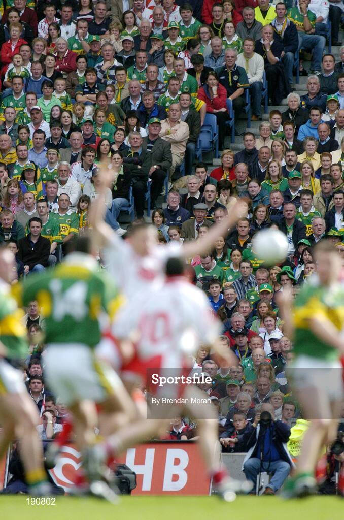 25 September 2005; A general view of fans watching the action during the game. Bank of Ireland All-Ireland Senior Football Championship Final, Kerry v Tyrone, Croke Park, Dublin. Picture credit; Brendan Moran / SPORTSFILE *** Local Caption *** Any photograph taken by SPORTSFILE during, or in connection with, the 2005 Bank of Ireland All-Ireland Senior Football Final which displays GAA logos or contains an image or part of an image of any GAA intellectual property, or, which contains images of a GAA player/players in their playing uniforms, may only be used for editorial and non-advertising purposes.  Use of photographs for advertising, as posters or for purchase separately is strictly prohibited unless prior written approval has been obtained from the Gaelic Athletic Association.