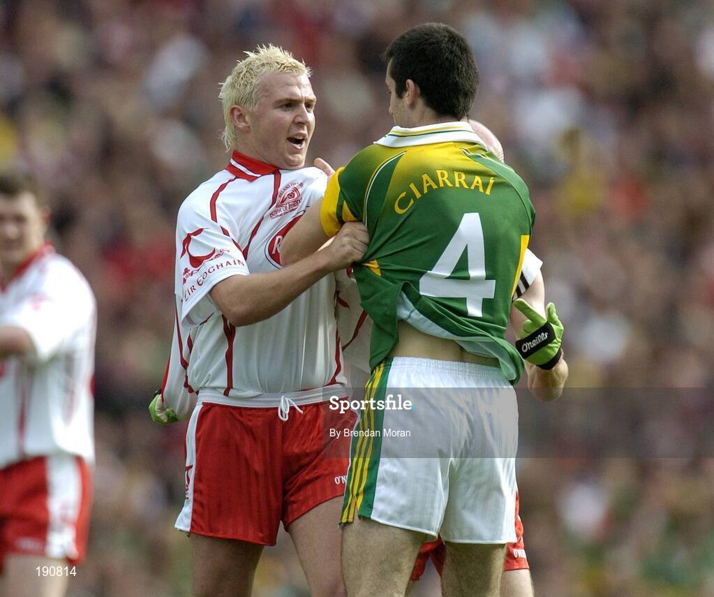 25 September 2005; Owen Mulligan, Tyrone, confronts Tom O'Sullivan, Kerry. Bank of Ireland All-Ireland Senior Football Championship Final, Kerry v Tyrone, Croke Park, Dublin. Picture credit; Brendan Moran / SPORTSFILE *** Local Caption *** Any photograph taken by SPORTSFILE during, or in connection with, the 2005 Bank of Ireland All-Ireland Senior Football Final which displays GAA logos or contains an image or part of an image of any GAA intellectual property, or, which contains images of a GAA player/players in their playing uniforms, may only be used for editorial and non-advertising purposes.  Use of photographs for advertising, as posters or for purchase separately is strictly prohibited unless prior written approval has been obtained from the Gaelic Athletic Association.