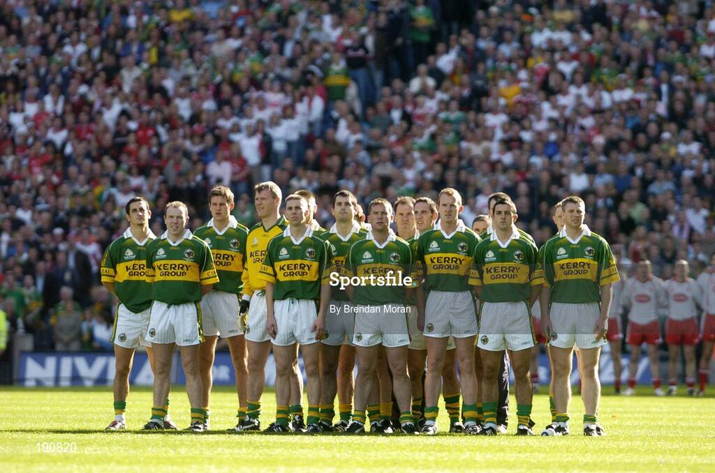 25 September 2005; The Kerry team stand together for the national anthem before the game. Bank of Ireland All-Ireland Senior Football Championship Final, Kerry v Tyrone, Croke Park, Dublin. Picture credit; Brendan Moran / SPORTSFILE *** Local Caption *** Any photograph taken by SPORTSFILE during, or in connection with, the 2005 Bank of Ireland All-Ireland Senior Football Final which displays GAA logos or contains an image or part of an image of any GAA intellectual property, or, which contains images of a GAA player/players in their playing uniforms, may only be used for editorial and non-advertising purposes.  Use of photographs for advertising, as posters or for purchase separately is strictly prohibited unless prior written approval has been obtained from the Gaelic Athletic Association.