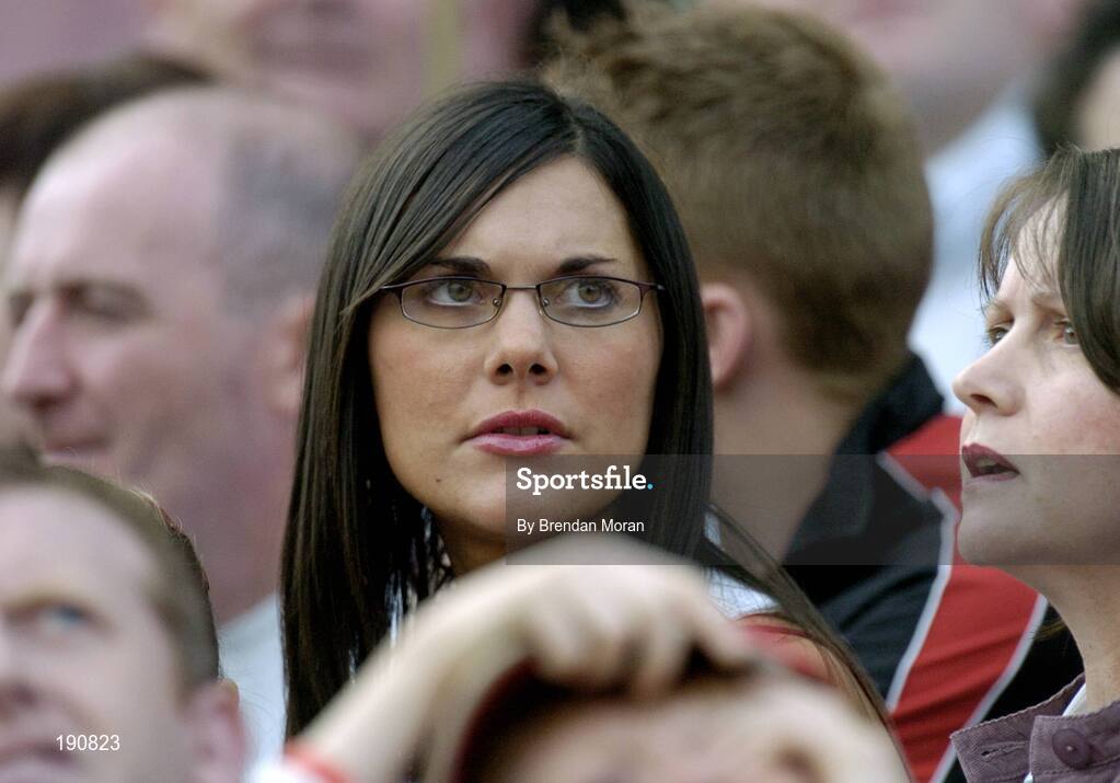 25 September 2005; Michaela Harte, daughter of Tyrone manager Mickey Harte, watches the game from the stands. Bank of Ireland All-Ireland Senior Football Championship Final, Kerry v Tyrone, Croke Park, Dublin. Picture credit; Brendan Moran / SPORTSFILE *** Local Caption *** Any photograph taken by SPORTSFILE during, or in connection with, the 2005 Bank of Ireland All-Ireland Senior Football Final which displays GAA logos or contains an image or part of an image of any GAA intellectual property, or, which contains images of a GAA player/players in their playing uniforms, may only be used for editorial and non-advertising purposes.  Use of photographs for advertising, as posters or for purchase separately is strictly prohibited unless prior written approval has been obtained from the Gaelic Athletic Association.