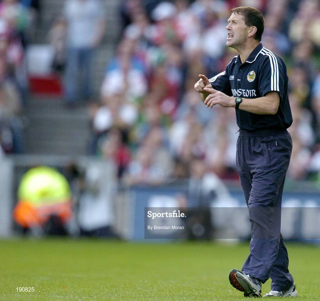 25 September 2005; Kerry manager Jack O'Connor issues instructions to his players during the game. Bank of Ireland All-Ireland Senior Football Championship Final, Kerry v Tyrone, Croke Park, Dublin. Picture credit; Brendan Moran / SPORTSFILE *** Local Caption *** Any photograph taken by SPORTSFILE during, or in connection with, the 2005 Bank of Ireland All-Ireland Senior Football Final which displays GAA logos or contains an image or part of an image of any GAA intellectual property, or, which contains images of a GAA player/players in their playing uniforms, may only be used for editorial and non-advertising purposes.  Use of photographs for advertising, as posters or for purchase separately is strictly prohibited unless prior written approval has been obtained from the Gaelic Athletic Association.