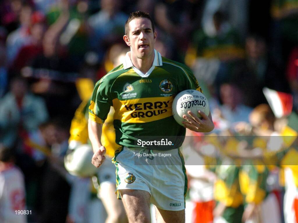 25 September 2005; Kerry captain Declan O'Sullivan leads his team onto the pitch. Bank of Ireland All-Ireland Senior Football Championship Final, Kerry v Tyrone, Croke Park, Dublin. Picture credit; Damien Eagers/ SPORTSFILE *** Local Caption *** Any photograph taken by SPORTSFILE during, or in connection with, the 2005 Bank of Ireland All-Ireland Senior Football Final which displays GAA logos or contains an image or part of an image of any GAA intellectual property, or, which contains images of a GAA player/players in their playing uniforms, may only be used for editorial and non-advertising purposes.  Use of photographs for advertising, as posters or for purchase separately is strictly prohibited unless prior written approval has been obtained from the Gaelic Athletic Association.