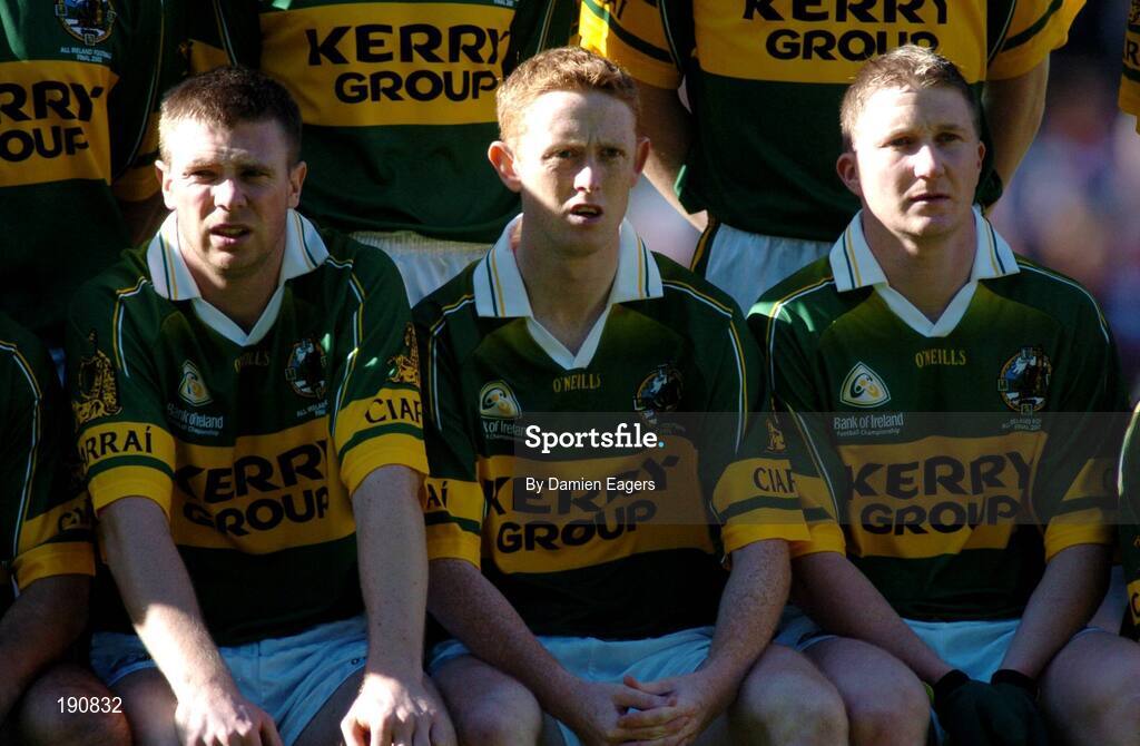 25 September 2005; Kerry's Tomas O Se, Colm Cooper, and Mike Frank Russell pose for the team photograph. Bank of Ireland All-Ireland Senior Football Championship Final, Kerry v Tyrone, Croke Park, Dublin. Picture credit; Damien Eagers/ SPORTSFILE *** Local Caption *** Any photograph taken by SPORTSFILE during, or in connection with, the 2005 Bank of Ireland All-Ireland Senior Football Final which displays GAA logos or contains an image or part of an image of any GAA intellectual property, or, which contains images of a GAA player/players in their playing uniforms, may only be used for editorial and non-advertising purposes.  Use of photographs for advertising, as posters or for purchase separately is strictly prohibited unless prior written approval has been obtained from the Gaelic Athletic Association.