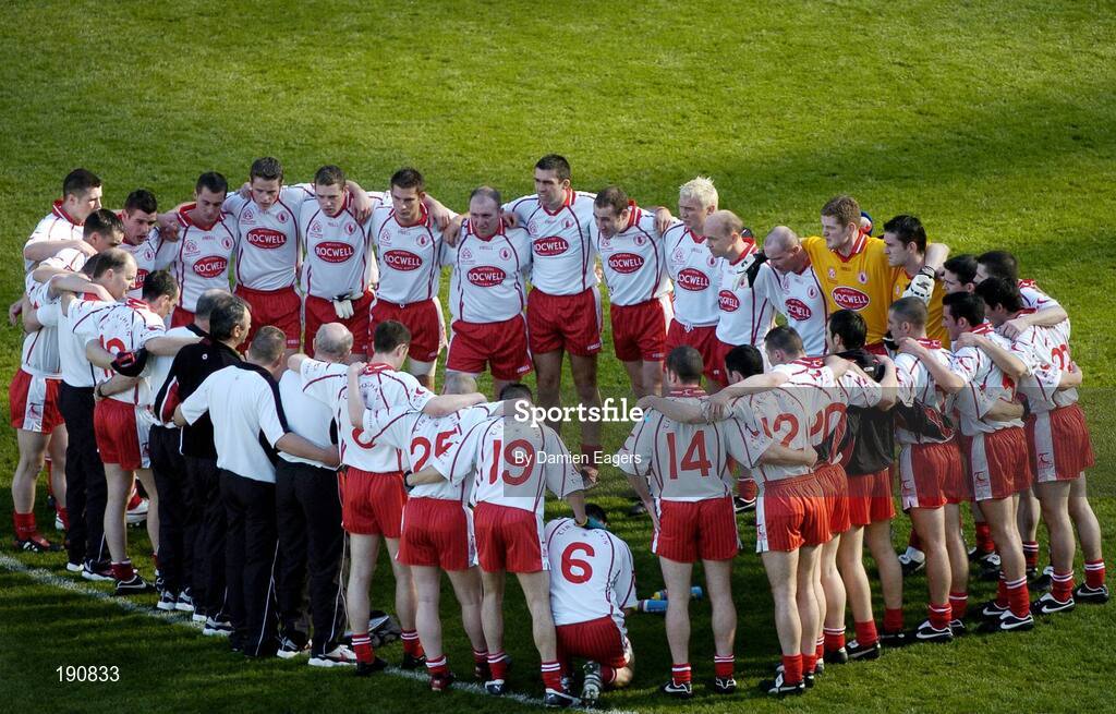 25 September 2005; The Tyrone squad and management pictured in a huddle before the match. Bank of Ireland All-Ireland Senior Football Championship Final, Kerry v Tyrone, Croke Park, Dublin. Picture credit; Damien Eagers/ SPORTSFILE *** Local Caption *** Any photograph taken by SPORTSFILE during, or in connection with, the 2005 Bank of Ireland All-Ireland Senior Football Final which displays GAA logos or contains an image or part of an image of any GAA intellectual property, or, which contains images of a GAA player/players in their playing uniforms, may only be used for editorial and non-advertising purposes.  Use of photographs for advertising, as posters or for purchase separately is strictly prohibited unless prior written approval has been obtained from the Gaelic Athletic Association.