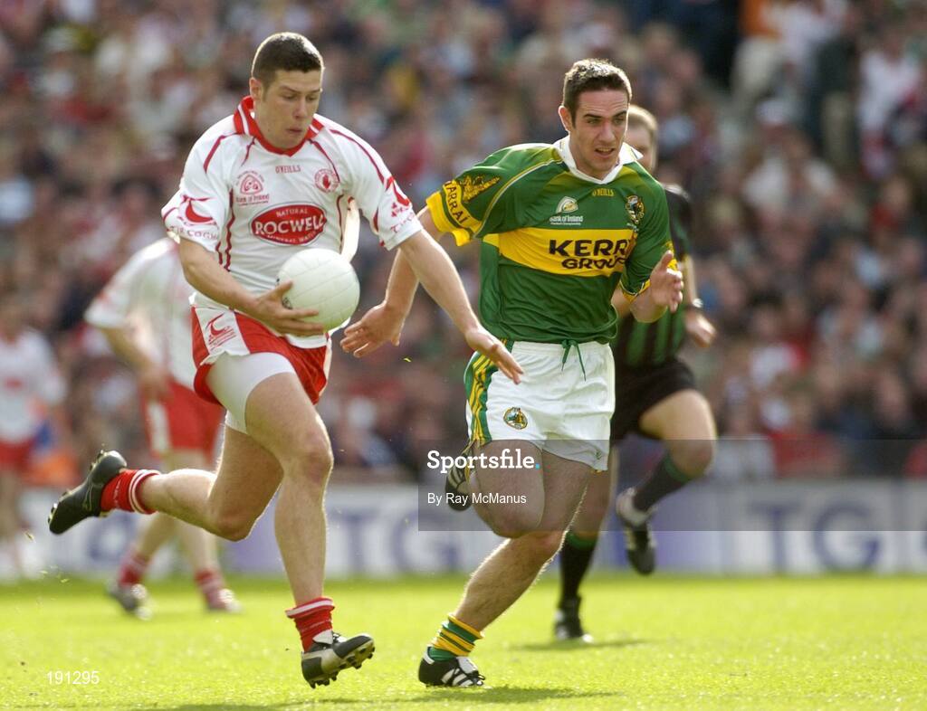25 September 2005; Sean Cavanagh, Tyrone, in action against Declan O'Sullivan, Kerry. Bank of Ireland All-Ireland Senior Football Championship Final, Kerry v Tyrone, Croke Park, Dublin. Picture credit; Ray McManus / SPORTSFILE *** Local Caption *** Any photograph taken by SPORTSFILE during, or in connection with, the 2005 Bank of Ireland All-Ireland Senior Football Final which displays GAA logos or contains an image or part of an image of any GAA intellectual property, or, which contains images of a GAA player/players in their playing uniforms, may only be used for editorial and non-advertising purposes.  Use of photographs for advertising, as posters or for purchase separately is strictly prohibited unless prior written approval has been obtained from the Gaelic Athletic Association.