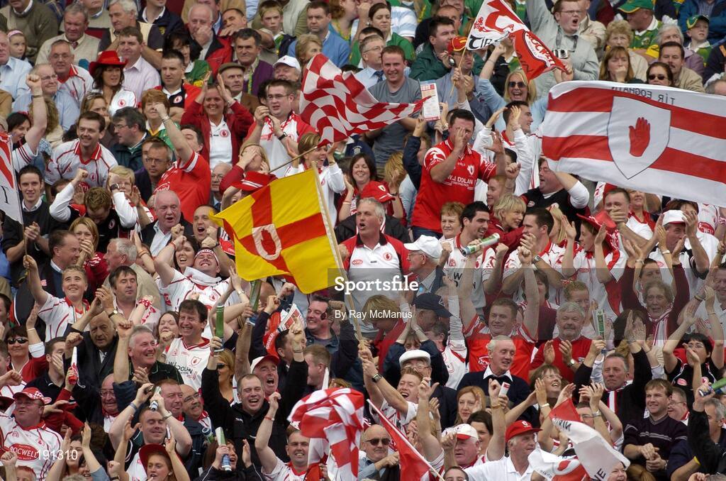 25 September 2005; Tyrone supporters cheer on their side. Bank of Ireland All-Ireland Senior Football Championship Final, Kerry v Tyrone, Croke Park, Dublin. Picture credit; Ray McManus / SPORTSFILE *** Local Caption *** Any photograph taken by SPORTSFILE during, or in connection with, the 2005 Bank of Ireland All-Ireland Senior Football Final which displays GAA logos or contains an image or part of an image of any GAA intellectual property, or, which contains images of a GAA player/players in their playing uniforms, may only be used for editorial and non-advertising purposes.  Use of photographs for advertising, as posters or for purchase separately is strictly prohibited unless prior written approval has been obtained from the Gaelic Athletic Association.