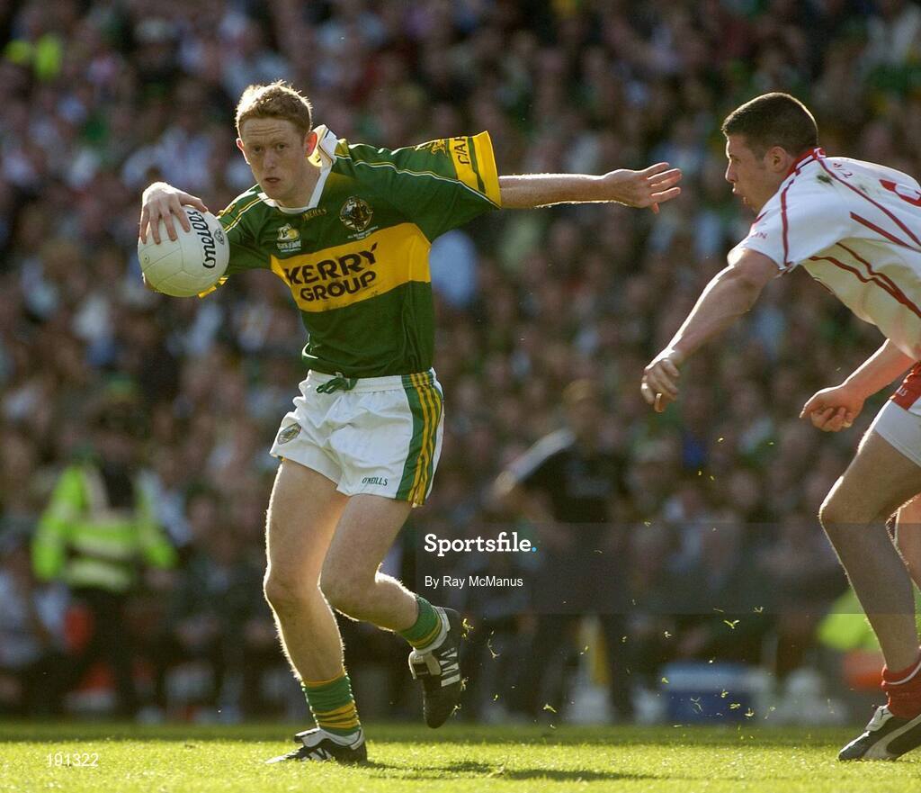 25 September 2005; Colm Cooper, Kerry, in action against Sean Cavanagh, Tyrone. Bank of Ireland All-Ireland Senior Football Championship Final, Kerry v Tyrone, Croke Park, Dublin. Picture credit; Ray McManus / SPORTSFILE *** Local Caption *** Any photograph taken by SPORTSFILE during, or in connection with, the 2005 Bank of Ireland All-Ireland Senior Football Final which displays GAA logos or contains an image or part of an image of any GAA intellectual property, or, which contains images of a GAA player/players in their playing uniforms, may only be used for editorial and non-advertising purposes.  Use of photographs for advertising, as posters or for purchase separately is strictly prohibited unless prior written approval has been obtained from the Gaelic Athletic Association.