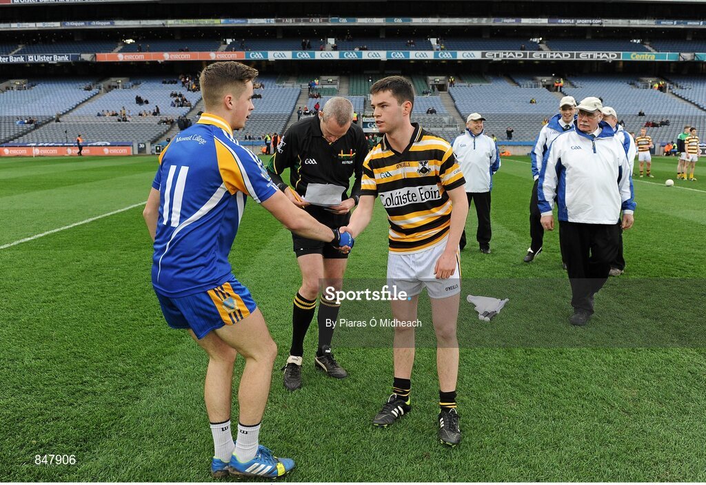 8 March 2014; Marist Athlone captain Niall Neary, left, and Coláiste Eoin captain Cillian Ó Séanáin shake hands before the pre-match coin toss, with referee Fergal Kelly, centre. Leinster Colleges Senior Football Championship Final, Coláiste Eoin v Marist Athlone. Croke Park, Dublin. Picture credit: Piaras Ó Mídheach / SPORTSFILE