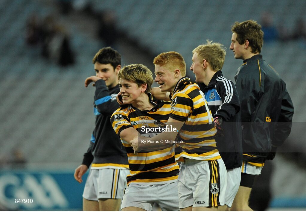 8 March 2014; Colm Ó Néill, 14, and Lúc Ó Giolláin, Coláiste Eoin, celebrate with team-mates at the final whistle. Leinster Colleges Senior Football Championship Final, Coláiste Eoin v Marist Athlone. Croke Park, Dublin. Picture credit: Piaras Ó Mídheach / SPORTSFILE