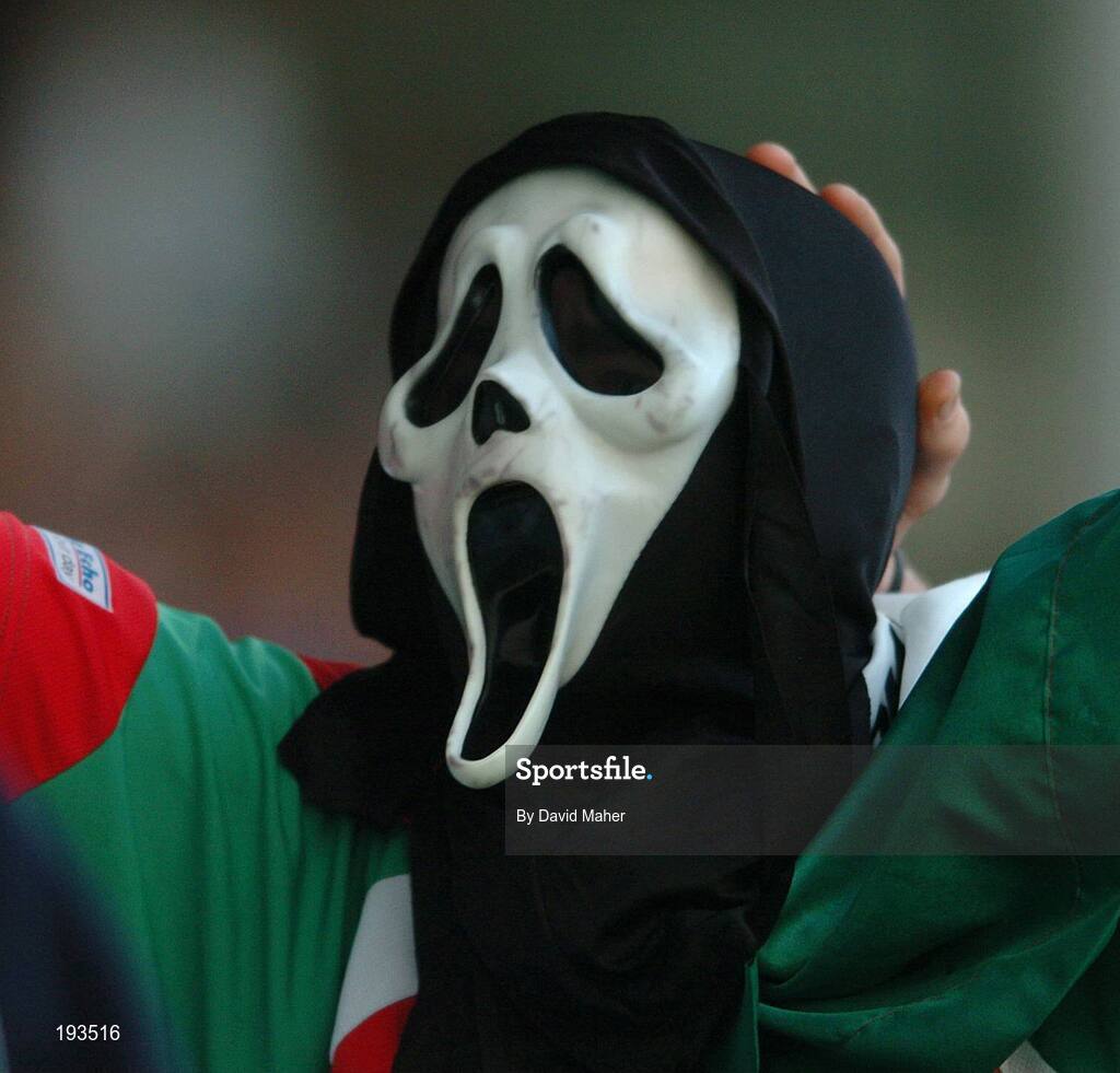 31 October 2005; A Cork City supporter wears a halloween mask in support of his  team. eircom League, Premier Division, Bohemians v Cork City, Dalymount Park, Dublin. Picture credit: David Maher / SPORTSFILE