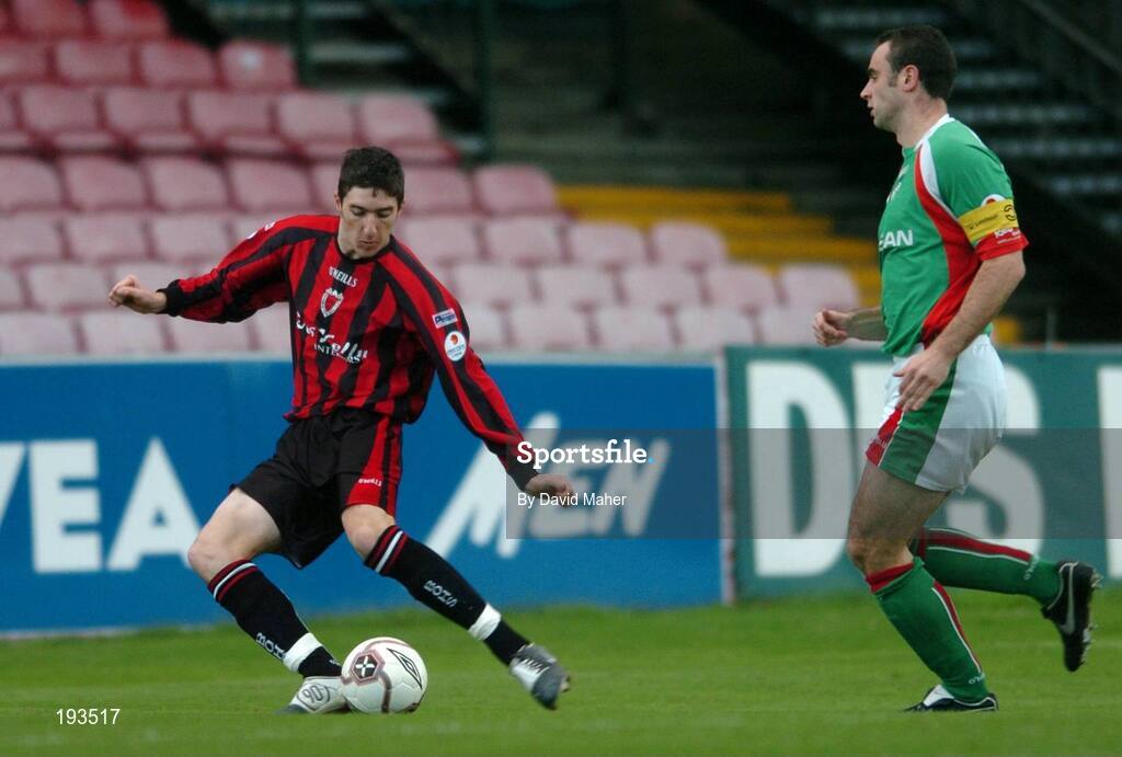 31 October 2005; Stephen Ward, Bohemians, beats Dan Murray, Cork City, to score his sides first goal. eircom League, Premier Division, Bohemians v Cork City, Dalymount Park, Dublin. Picture credit: David Maher / SPORTSFILE