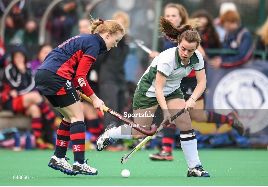 28 March 2014; Gemma Rhatigan, Salerno, in action against Tara Mcllwaine, Lurgan College.  Electric Ireland Kate Russell All-Ireland School Girls Hockey Final Tournament, Salerno, Co. Galway v Lurgan College, Co. Armagh. St Andrews College, Booterstown, Co Dublin. Picture credit: Matt Browne / SPORTSFILE