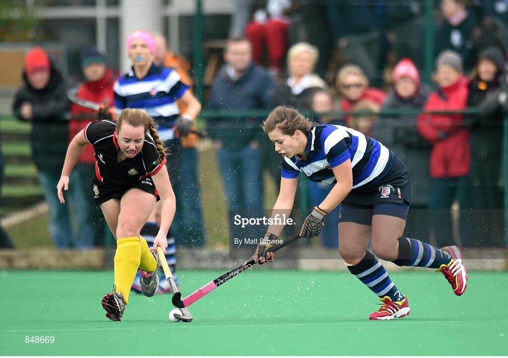 28 March 2014; Michelle Barrett, Crescent College, in action against Katherine Geoghegan, Kilkenny College. Electric Ireland Kate Russell All-Ireland School Girls Hockey Final Tournament, Crescent College, Co. Limerick v Kilkenny College, Co. Kilkenny. St Andrews College, Booterstown, Co. Dublin. Picture credit: Matt Browne / SPORTSFILE