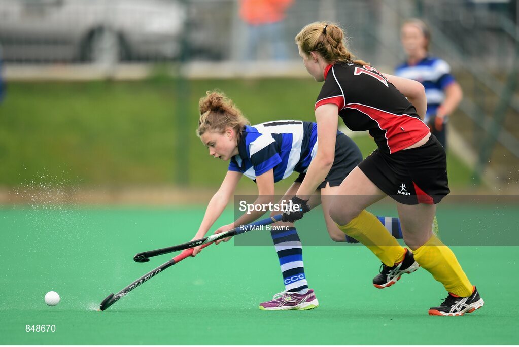 28 March 2014; Jane Kirby, Crescent College, in action against Judy Dick, Kilkenny College. Electric Ireland Kate Russell All-Ireland School Girls Hockey Final Tournament, Crescent College, Co. Limerick v Kilkenny College, Co. Kilkenny. St Andrews College, Booterstown, Co. Dublin. Picture credit: Matt Browne / SPORTSFILE