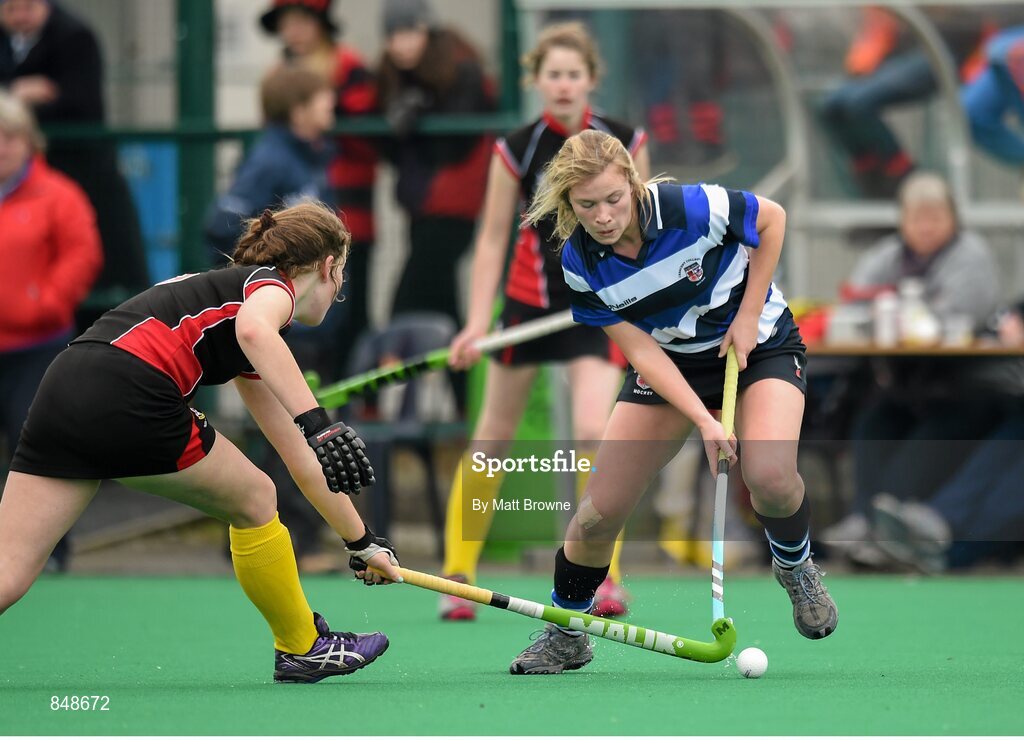 28 March 2014; Jenni O'Malley, Crescent College, in action against Debbie Young, Kilkenny College. Electric Ireland Kate Russell All-Ireland School Girls Hockey Final Tournament, Crescent College, Co. Limerick v Kilkenny College, Co. Kilkenny. St Andrews College, Booterstown, Co. Dublin. Picture credit: Matt Browne / SPORTSFILE