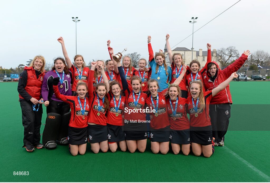 28 March 2014; Lurgan College, Co. Armagh, players celebrate with the trophy. Electric Ireland Kate Russell All-Ireland School Girls Hockey Final Tournament, St Andrews College, Dublin v Lurgan College, Co. Armagh, St Andrews College, Booterstown, Co Dublin. Picture credit: Matt Browne / SPORTSFILE