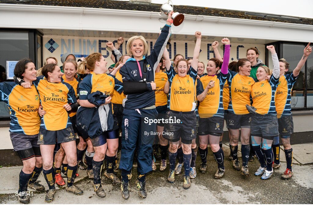 29 March 2014; Clondalkin captain Shona Byrne lifts the cup with her team-mates after the game. The Paul Flood Cup Final, Clondalkin v Gorey, NUIM Barhnall RFC, Leixlip, Co. Kildare. Picture credit: Barry Cregg / SPORTSFILE