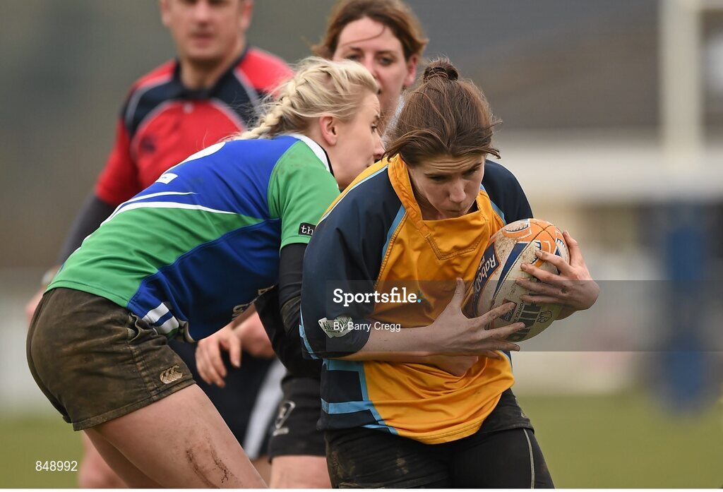 29 March 2014; Claire Winters, Clondalkin, is tackled by Orla Power, Gorey. The Paul Flood Cup Final, Clondalkin v Gorey, NUIM Barhnall RFC, Leixlip, Co. Kildare. Picture credit: Barry Cregg / SPORTSFILE