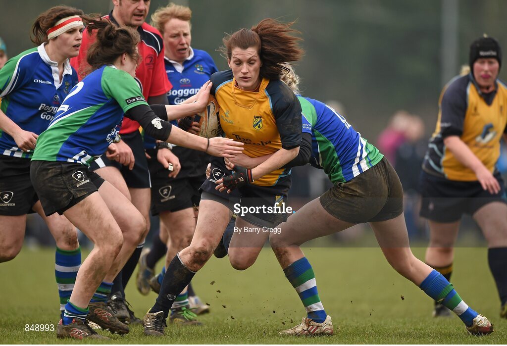 29 March 2014; Gael Stowe, Clondalkin, is tackled by Schalan Cullen, left, and Orla Power, Gorey. The Paul Flood Cup Final, Clondalkin v Gorey, NUIM Barhnall RFC, Leixlip, Co. Kildare. Picture credit: Barry Cregg / SPORTSFILE
