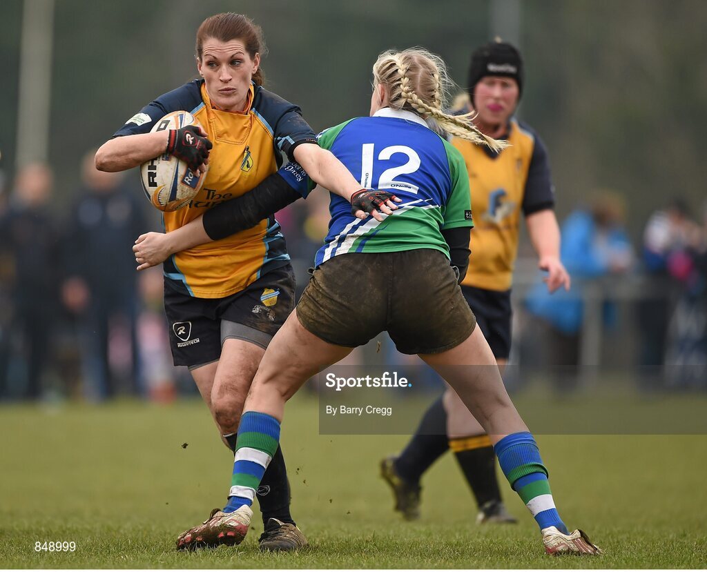 29 March 2014; Gael Stowe, Clondalkin, is tackled by Orla Power, Gorey. The Paul Flood Cup Final, Clondalkin v Gorey, NUIM Barhnall RFC, Leixlip, Co. Kildare. Picture credit: Barry Cregg / SPORTSFILE