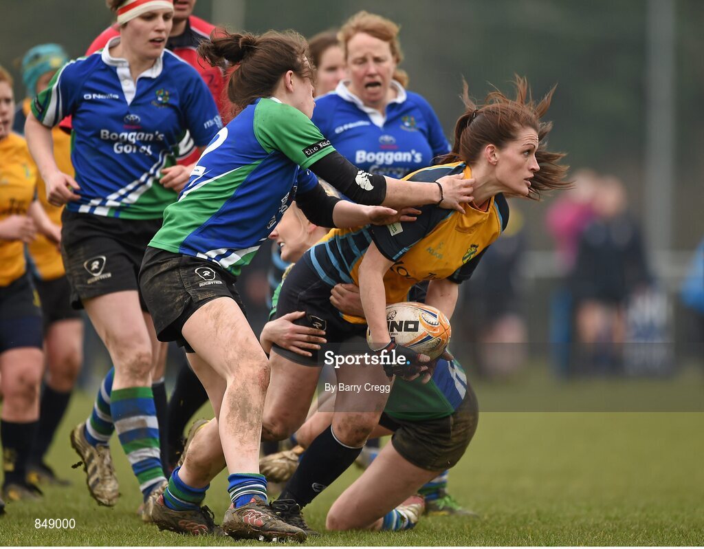 29 March 2014; Gael Stowe, Clondalkin, is tackled by Schalan Cullen, left, and Orla Power, Gorey. The Paul Flood Cup Final, Clondalkin v Gorey, NUIM Barhnall RFC, Leixlip, Co. Kildare. Picture credit: Barry Cregg / SPORTSFILE