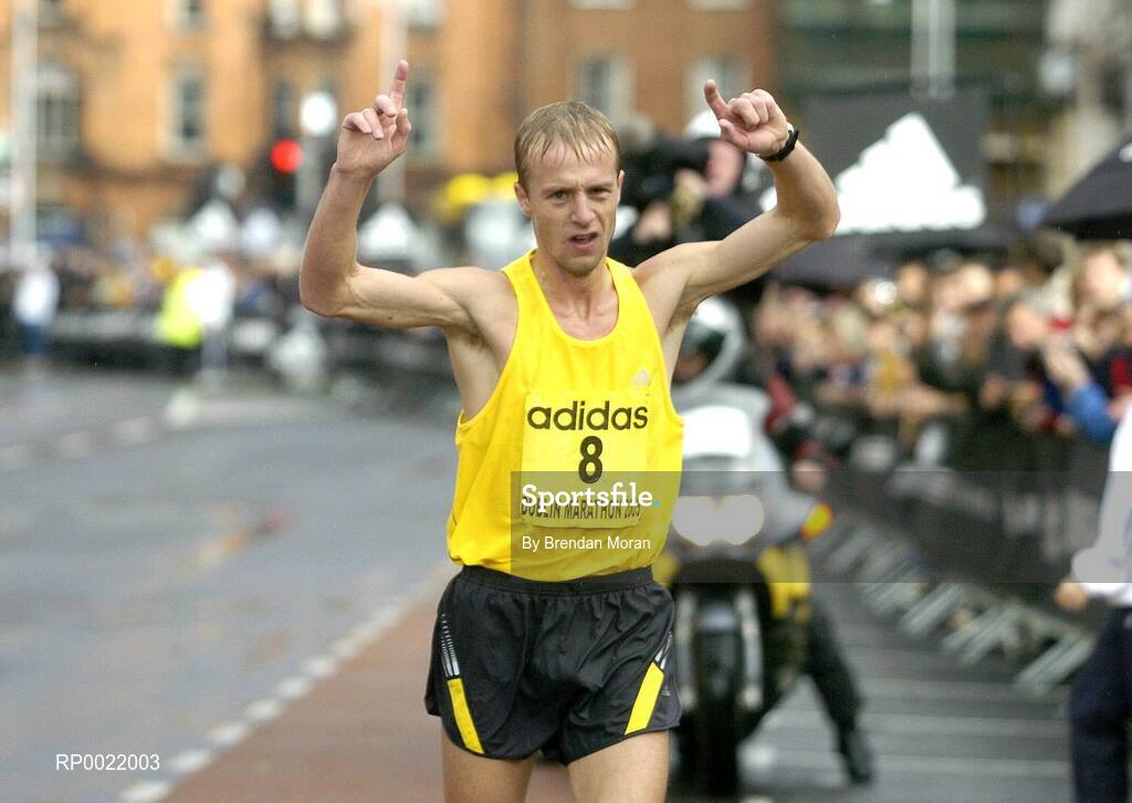 31 October 2005; Dmytro Osadchy of the Ukraine celebrates winning the Men's race at the 2005 adidas Dublin City Marathon. Picture credit: Brendan Moran / SPORTSFILE