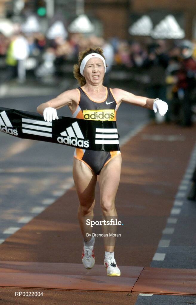 31 October 2005; Zinadia Semenova of Russia crosses the line to win the Women's race at the 2005 adidas Dublin City Marathon. Picture credit: Brendan Moran / SPORTSFILE