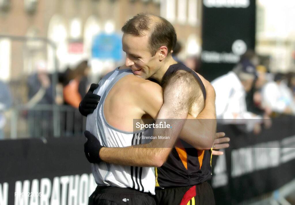 31 October 2005; Pauric McKinney, right, congratulates Gary Crossan after they finished 2nd and 1st Irish men home respectively, which also doubled as the National Marathon Championship, during the 2005 adidas Dublin City Marathon. Picture credit: Brendan Moran / SPORTSFILE