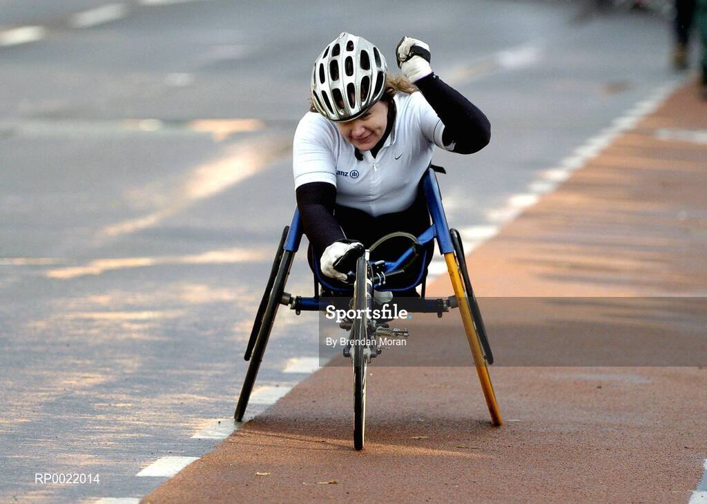 31 October 2005; Patrice Dockery celebrates after winning the Women's wheelchair section during the 2005 adidas Dublin City Marathon. Picture credit: Brendan Moran / SPORTSFILE
